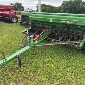 John Deere 450 8' grain drill with grass box and press wheels.