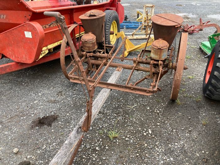 Farquhar Iron Age 2 row pull type corn planter yard art