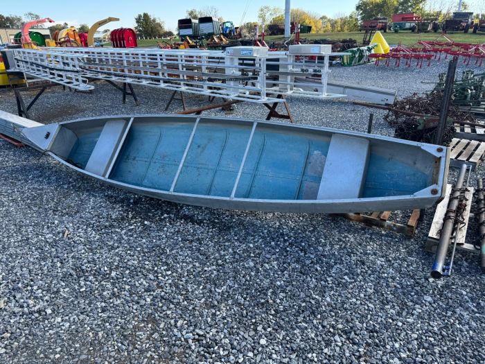 Aluminum canoe with Johnson motor